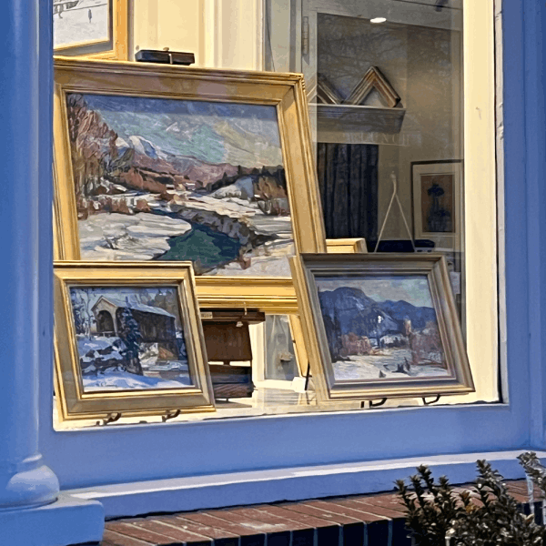 Paintings of winter scenes at Page Waterman Gallery and Framing in Natick, MA.