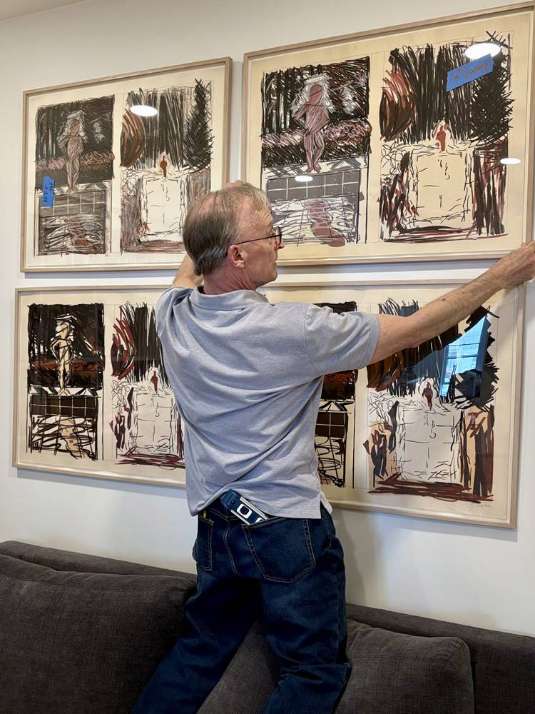 installing group of four contemporary prints